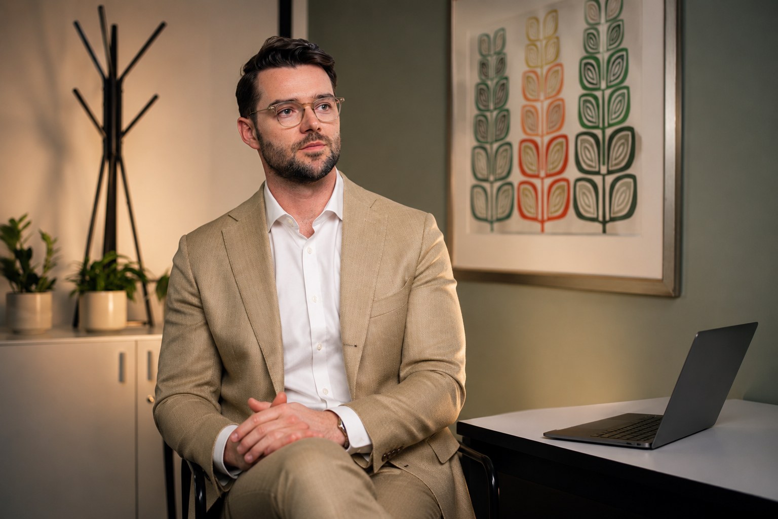 Dr George Collins in consultation